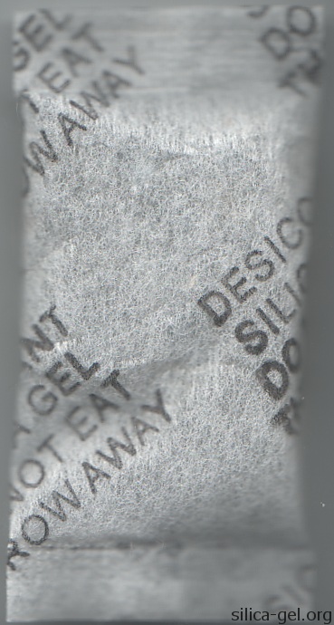 Narrow textured packet with black writing.